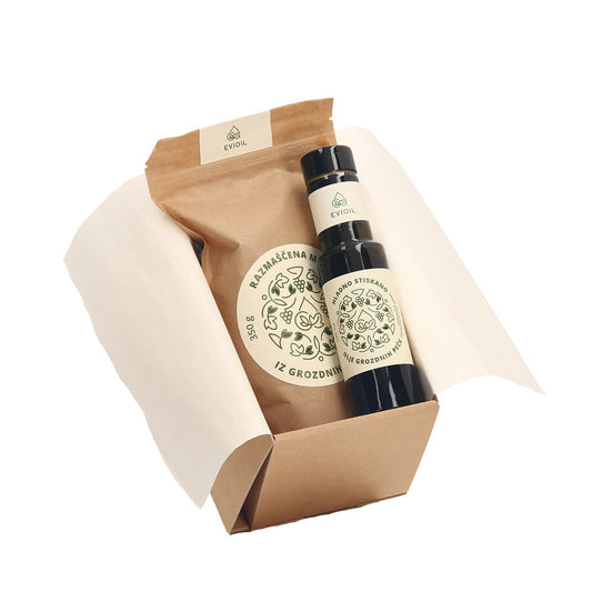 Darilni paket olje grozdnih pešk 100 ml in moka grozdnih pešk Evioil v darilni škatli z napisom ostani zdrav - a